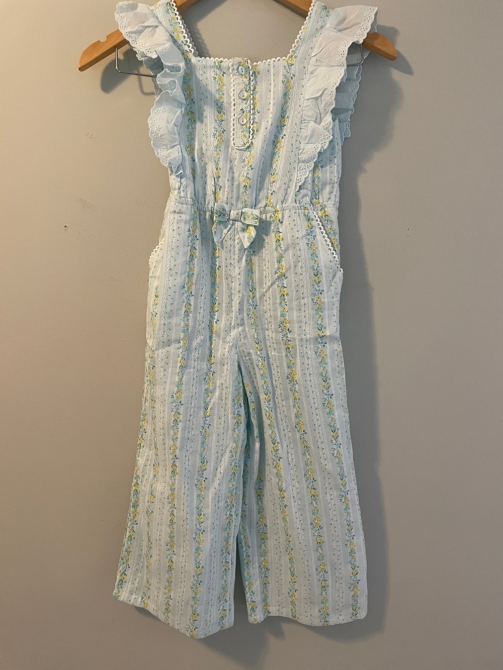 Tommy Bahama girls pant jumpsuit. blue/yellow flowers. size:6. like new